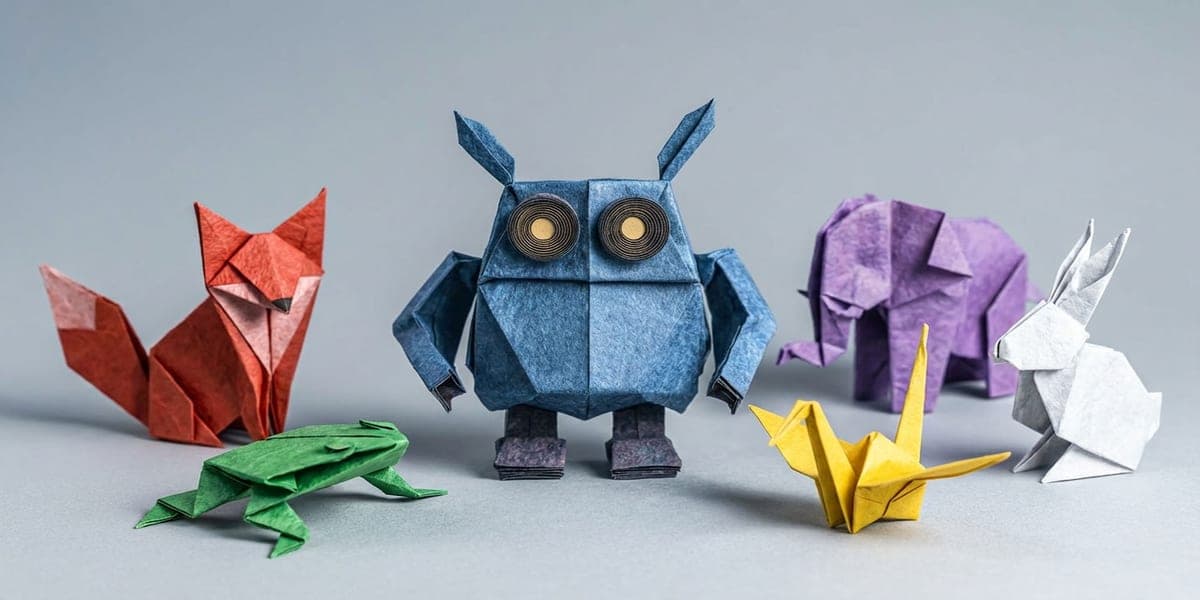 Chatbot IA per al Museu de l'Origami — assistent conversacional amb memòria, integrable amb una línia de codi